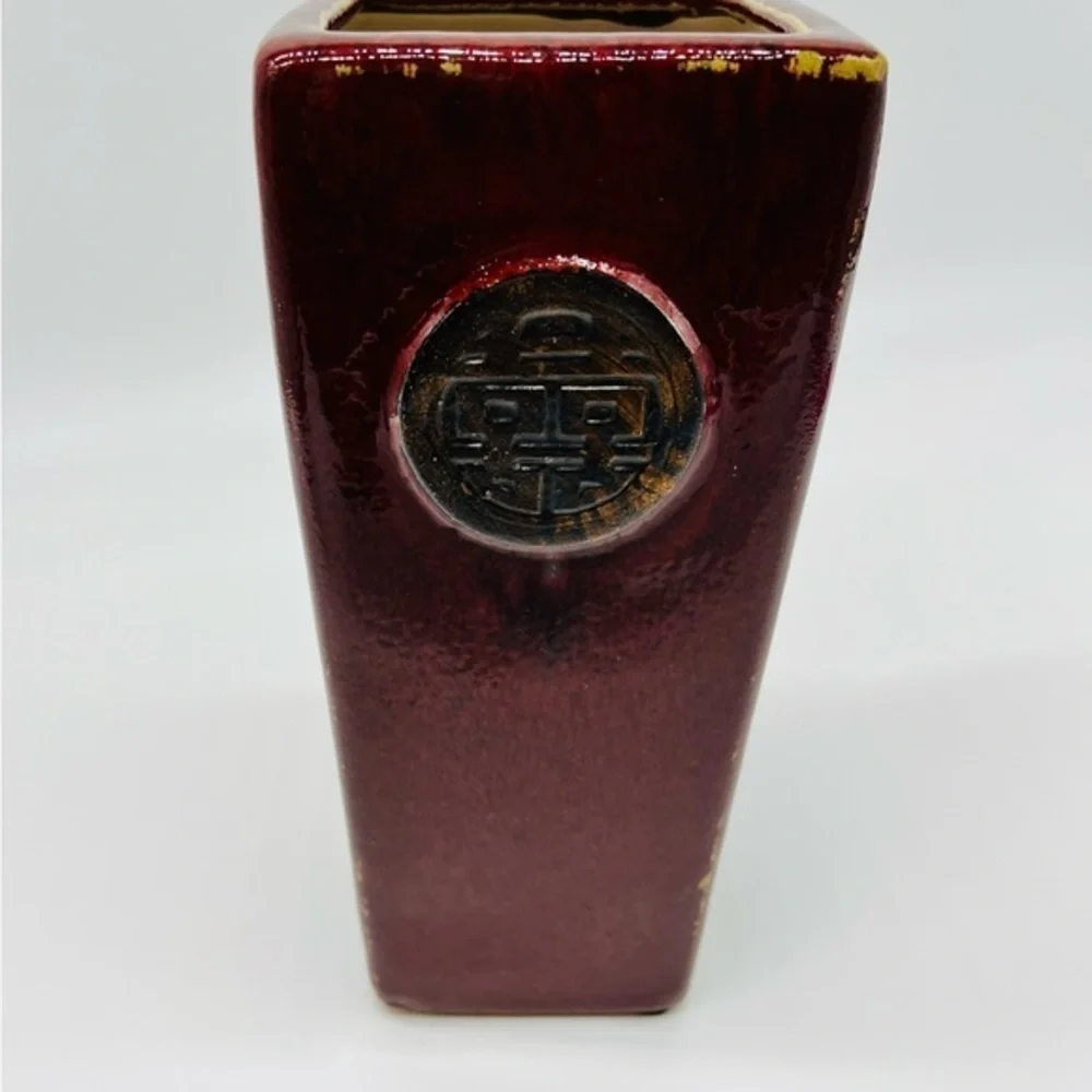 Beautiful wine colored ceramic distressed decorative vase with Chinese symbols